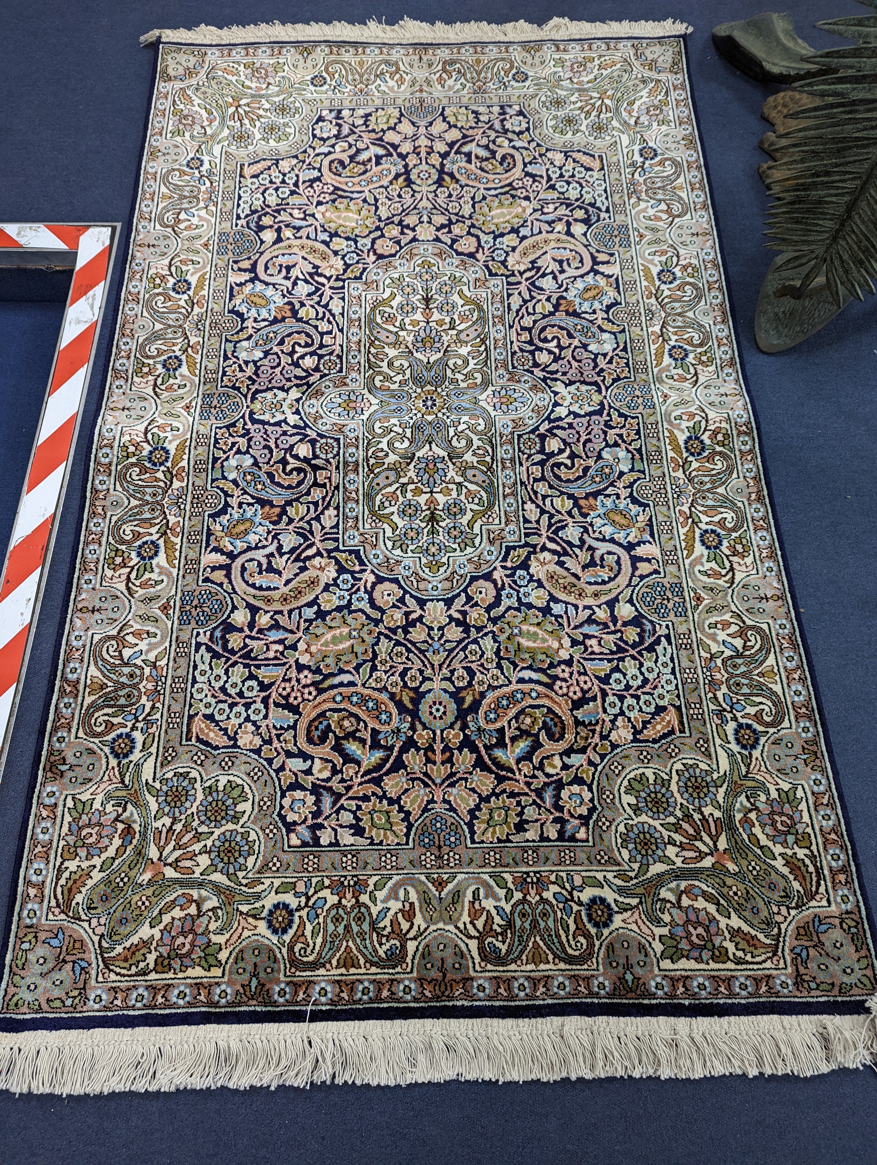 A Kashmiri silk rug, 160 x 96cm